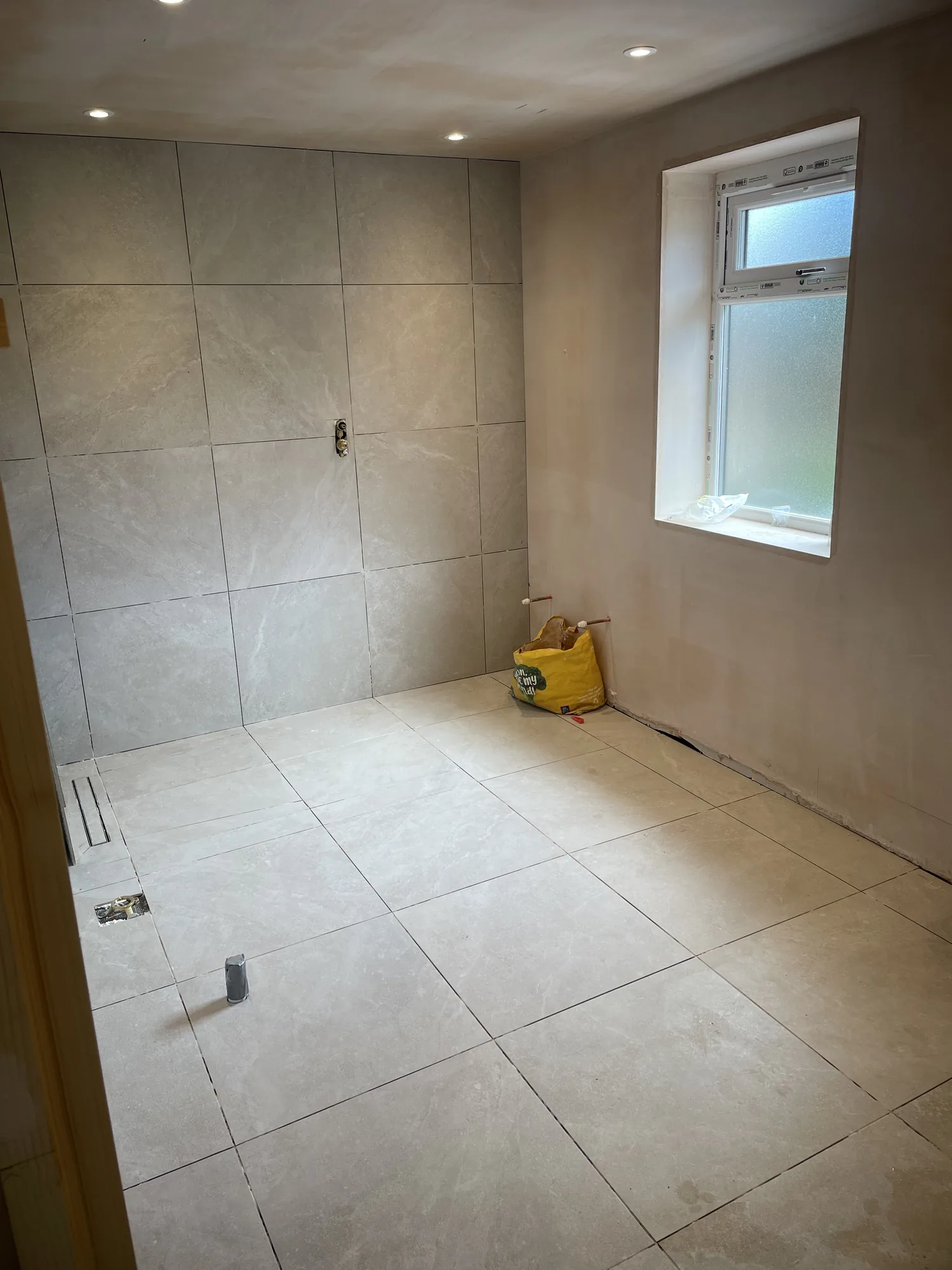 Tiled room with new electrics after a rewire